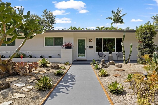 950 NE 88th St, Miami, FL 33138 - view of front facade with stucco siding