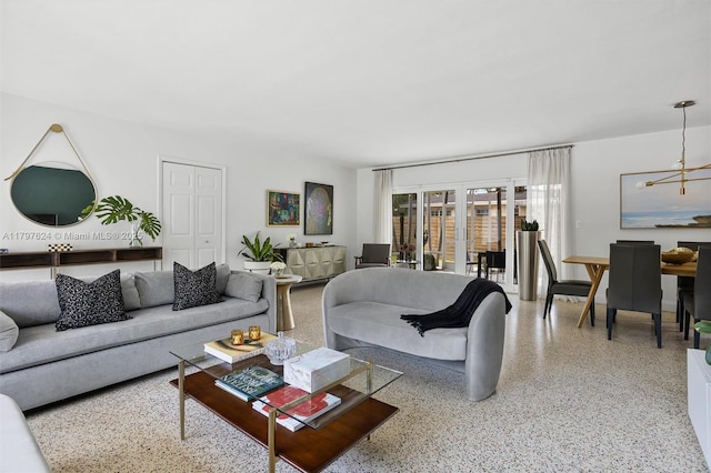 950 NE 88th St, Miami, FL 33138 - living area with speckle patterned floor and a chandelier