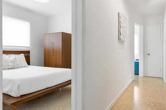 950 NE 88th St, Miami, FL 33138 - bedroom with speckled floor and baseboards