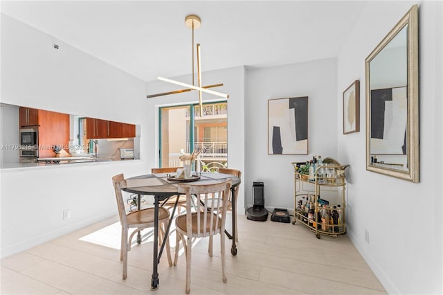 140 Jefferson Ave Unit 14020, Miami Beach, FL 33139 - dining area with light wood-style flooring