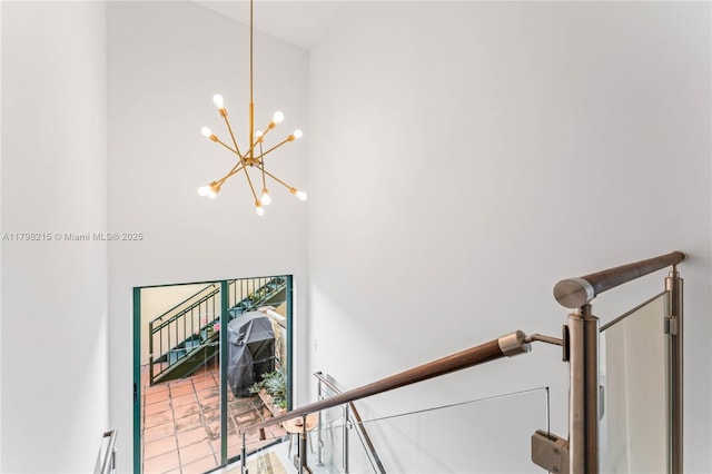 140 Jefferson Ave Unit 14020, Miami Beach, FL 33139 - stairs featuring a chandelier