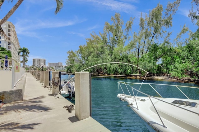 2840 NE 14th St Cswy Unit 408A, Pompano Beach, FL 33062 - view of swimming pool with a water view and a boat dock