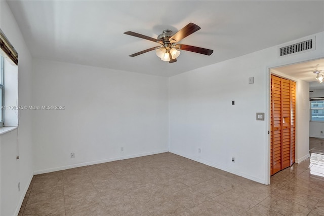 2840 NE 14th St Cswy Unit 408A, Pompano Beach, FL 33062 - unfurnished room featuring a ceiling fan, baseboards, and tile patterned floors