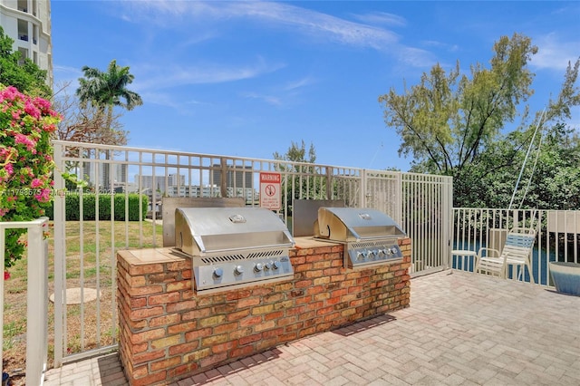 2840 NE 14th St Cswy Unit 408A, Pompano Beach, FL 33062 - view of patio with area for grilling and exterior kitchen