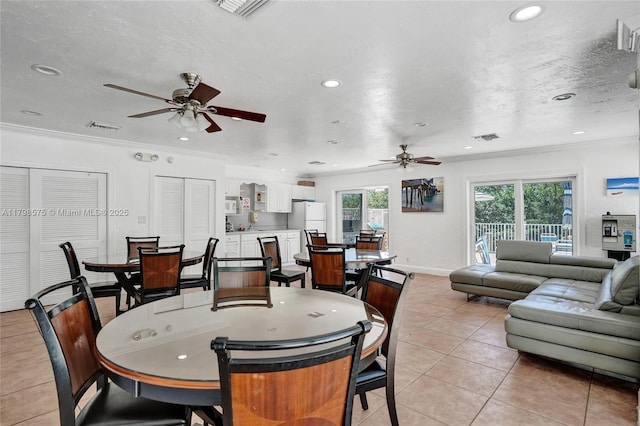 2840 NE 14th St Cswy Unit 408A, Pompano Beach, FL 33062 - dining room featuring a ceiling fan, recessed lighting, light tile patterned floors, crown molding, and baseboards