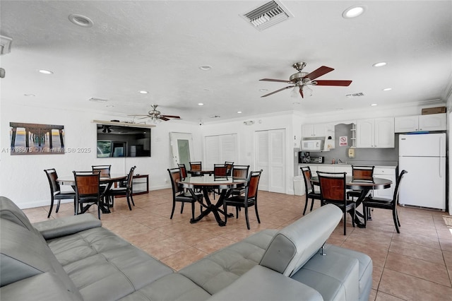 2840 NE 14th St Cswy Unit 408A, Pompano Beach, FL 33062 - living room with a ceiling fan, light tile patterned flooring, recessed lighting, crown molding, and baseboards