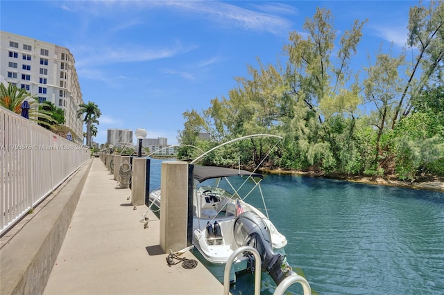2840 NE 14th St Cswy Unit 408A, Pompano Beach, FL 33062 - dock area with a water view and fence