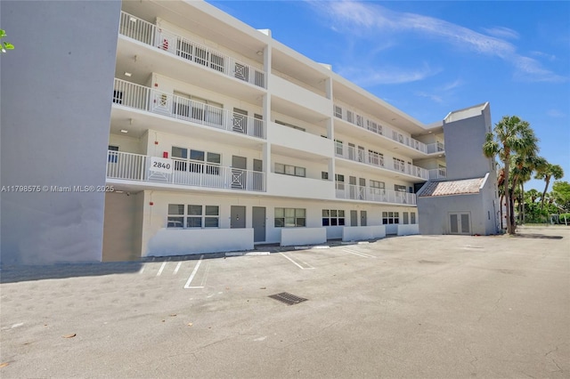 2840 NE 14th St Cswy Unit 408A, Pompano Beach, FL 33062 - view of apartment building / complex featuring uncovered parking