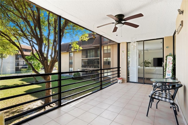 665 NE 195th St Unit 223, Miami, FL 33179 - sunroom featuring a ceiling fan