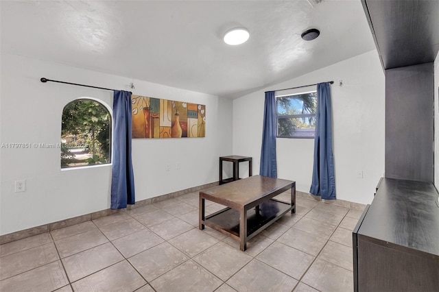 1226 Cordova St, Coral Gables, FL 33134 - dining space with light tile patterned flooring and vaulted ceiling