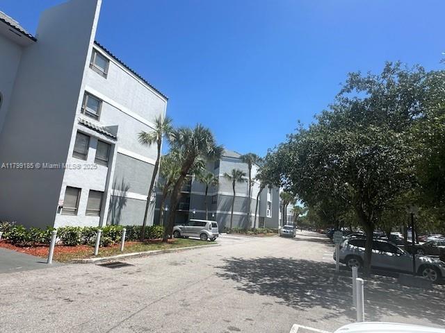 1820 N Congress Ave Unit 405, West Palm Beach, FL 33401 - view of asphalt road