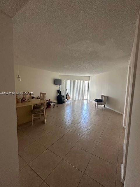 2000 N Congress Ave Unit 411, West Palm Beach, FL 33401 - interior space featuring a textured ceiling