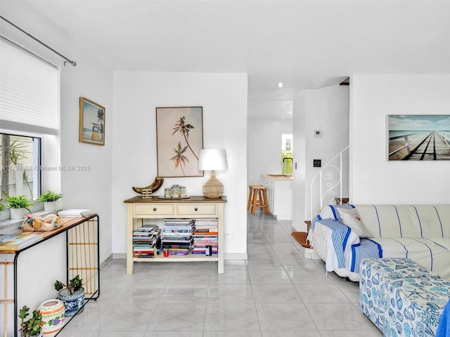 729 85th St, Miami Beach, FL 33141 - living room featuring baseboards and marble finish floors