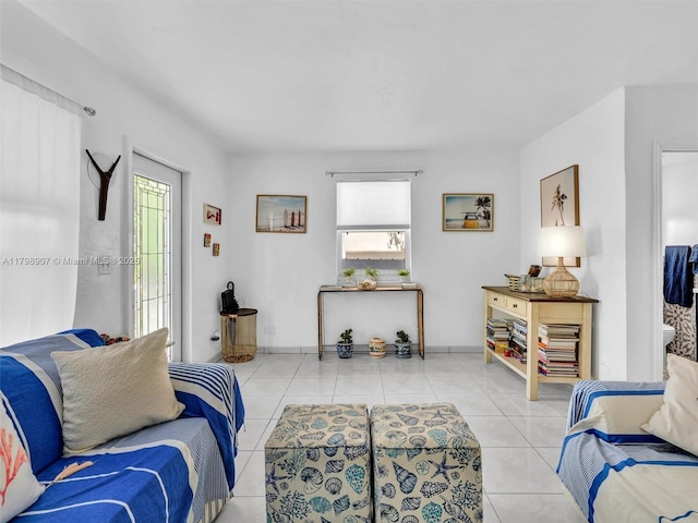 729 85th St, Miami Beach, FL 33141 - living room featuring plenty of natural light and tile patterned flooring