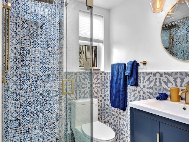 729 85th St, Miami Beach, FL 33141 - bathroom with a shower stall, wainscoting, toilet, and vanity