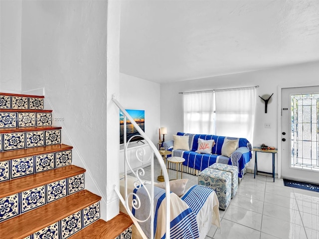 729 85th St, Miami Beach, FL 33141 - tiled living area with stairs and baseboards