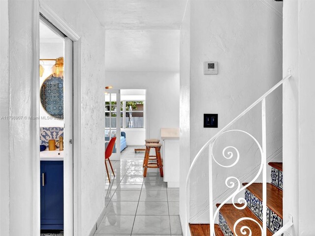 729 85th St, Miami Beach, FL 33141 - stairs with marble finish floors and a textured wall
