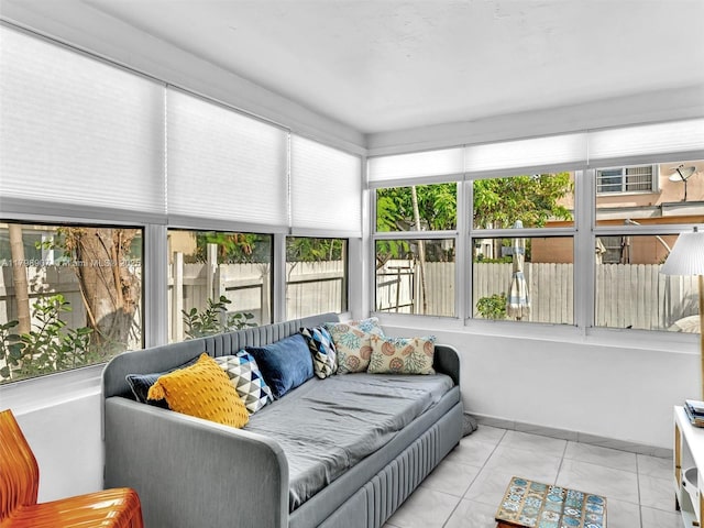 729 85th St, Miami Beach, FL 33141 - sunroom featuring outdoor lounge area and marble look tiles
