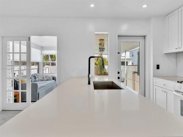 729 85th St, Miami Beach, FL 33141 - bar area with a sink, white electric range, and recessed lighting