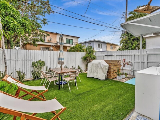 729 85th St, Miami Beach, FL 33141 - view of yard featuring outdoor dining space