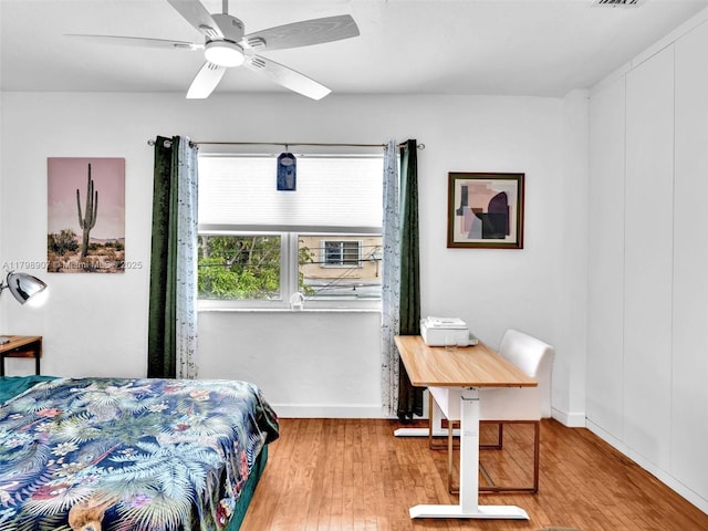 729 85th St, Miami Beach, FL 33141 - bedroom with wood finished floors and baseboards