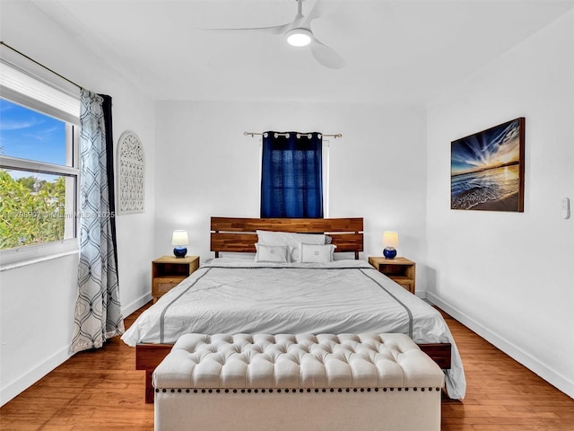 729 85th St, Miami Beach, FL 33141 - bedroom featuring wood finished floors, baseboards, and a ceiling fan