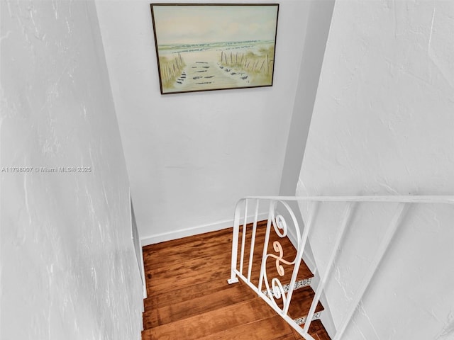 729 85th St, Miami Beach, FL 33141 - staircase with wood finished floors and baseboards