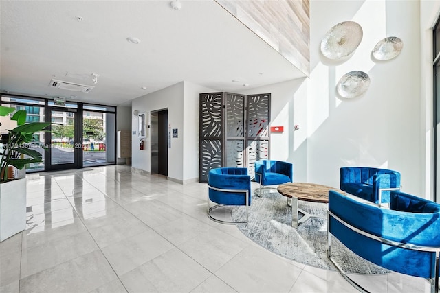 common area featuring a wall of windows