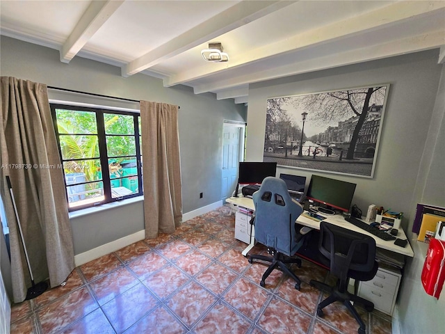 tiled office featuring beamed ceiling and baseboards