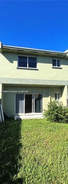 20441 NW 15th Ave Unit 8, Miami Gardens, FL 33169 - back of property with stucco siding