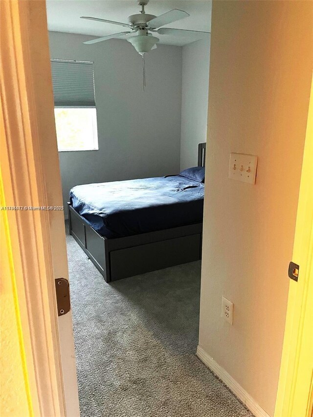 20441 NW 15th Ave Unit 8, Miami Gardens, FL 33169 - bedroom with carpet flooring and ceiling fan
