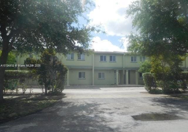 20441 NW 15th Ave Unit 8, Miami Gardens, FL 33169 - view of front of house featuring stucco siding