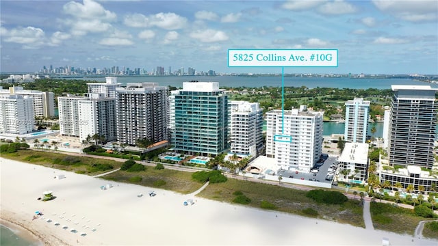 5825 Collins Ave Unit 10G, Miami Beach, FL 33140 - aerial view of waterfront with a beach and a view of skyline