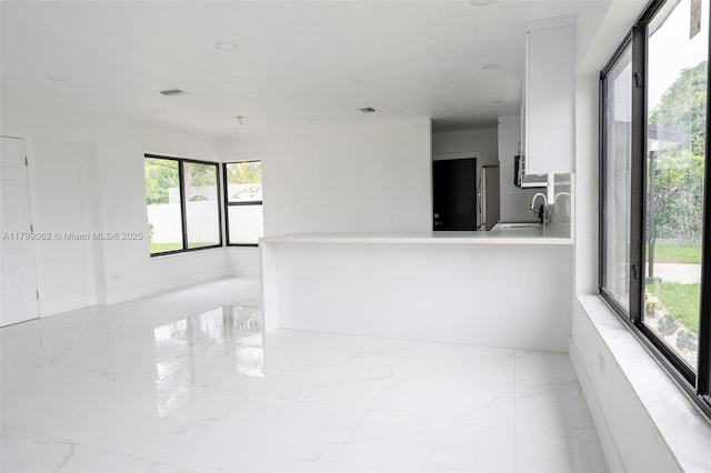17940 NW 13th Ct, Miami Gardens, FL 33169 - spare room featuring light marble finish floors and recessed lighting