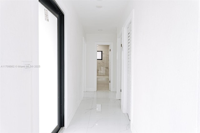 17940 NW 13th Ct, Miami Gardens, FL 33169 - hall featuring light marble finish floors and baseboards
