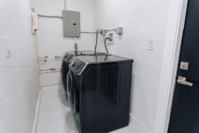 17940 NW 13th Ct, Miami Gardens, FL 33169 - laundry room featuring electric panel, washer and dryer, and light marble finish floors