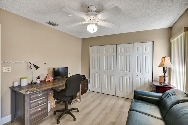 1930 W Oak Knoll Cir, Davie, FL 33324 - office area with light wood-style flooring, a textured ceiling, a ceiling fan, and baseboards