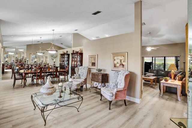 1930 W Oak Knoll Cir, Davie, FL 33324 - living area with light wood-style flooring, ceiling fan, and high vaulted ceiling