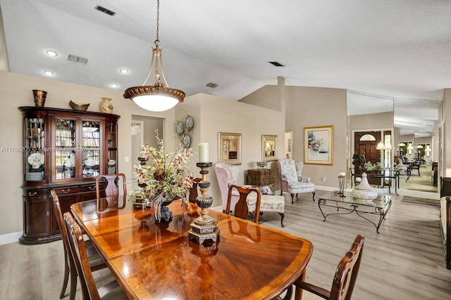 1930 W Oak Knoll Cir, Davie, FL 33324 - dining area featuring baseboards, light wood-style flooring, vaulted ceiling, and recessed lighting