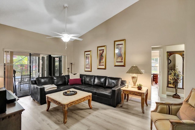 1930 W Oak Knoll Cir, Davie, FL 33324 - living room with light wood-style floors, high vaulted ceiling, ceiling fan, and baseboards