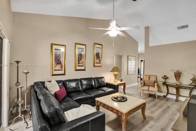 1930 W Oak Knoll Cir, Davie, FL 33324 - living area with ceiling fan, light wood-type flooring, baseboards, and high vaulted ceiling