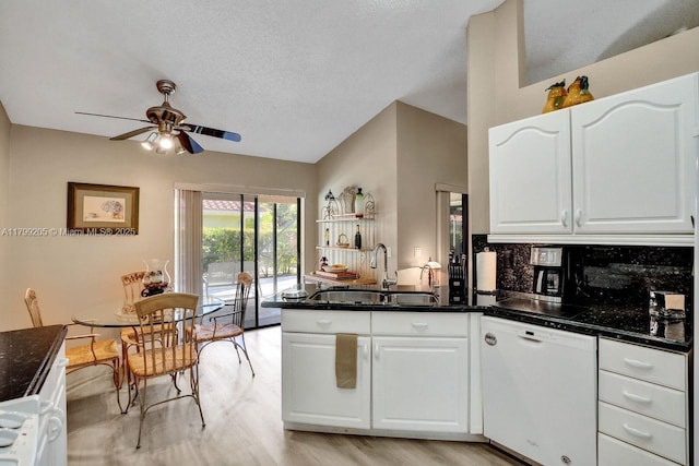 1930 W Oak Knoll Cir, Davie, FL 33324 - kitchen featuring dishwasher, a sink, a peninsula, ceiling fan, and light wood-type flooring