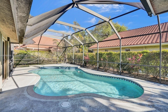 1930 W Oak Knoll Cir, Davie, FL 33324 - swimming pool with a patio and glass enclosure