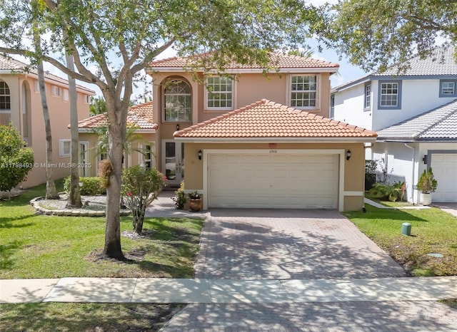 11919 NW 47th St, Coral Springs, FL 33076 - mediterranean / spanish-style home featuring stucco siding, a tiled roof, a garage, driveway, and a front lawn