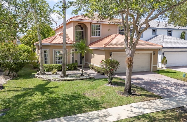 11919 NW 47th St, Coral Springs, FL 33076 - mediterranean / spanish home with a garage, stucco siding, a tile roof, and a front yard