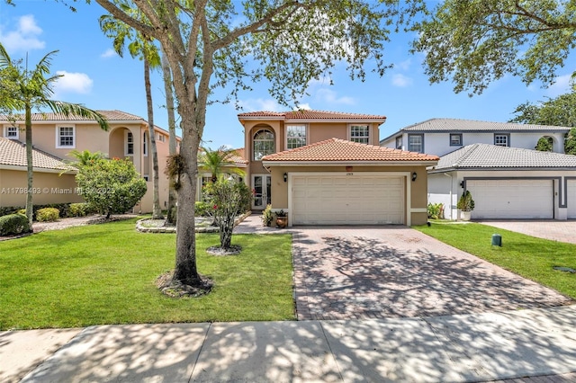 11919 NW 47th St, Coral Springs, FL 33076 - mediterranean / spanish home with stucco siding, an attached garage, a front yard, driveway, and a tiled roof