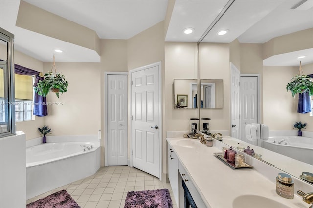 11919 NW 47th St, Coral Springs, FL 33076 - full bathroom with a bath, tile patterned flooring, double vanity, a closet, and recessed lighting