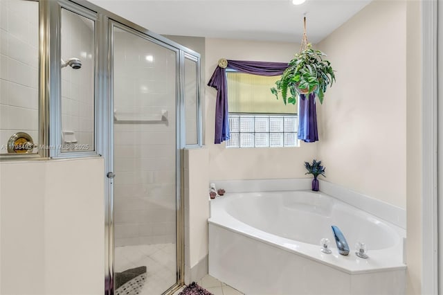 11919 NW 47th St, Coral Springs, FL 33076 - full bath with a garden tub, a shower stall, and tile patterned floors