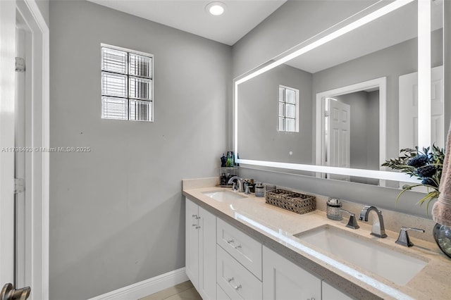 11919 NW 47th St, Coral Springs, FL 33076 - bathroom with baseboards and double vanity