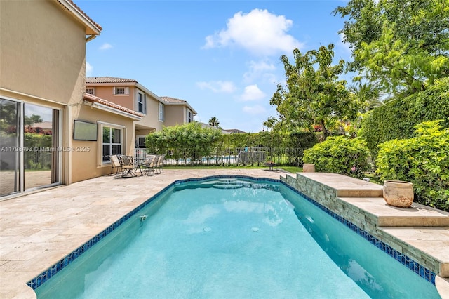 11919 NW 47th St, Coral Springs, FL 33076 - view of pool with a patio and a fenced backyard